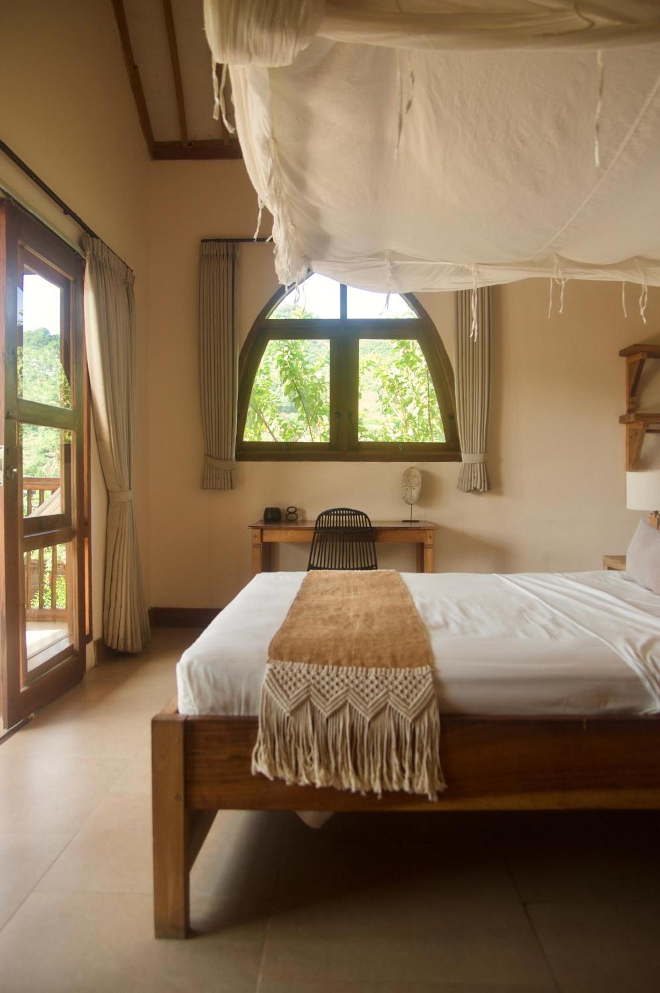 Owa Lodge Areguling Kuta  Pokoj fotografie